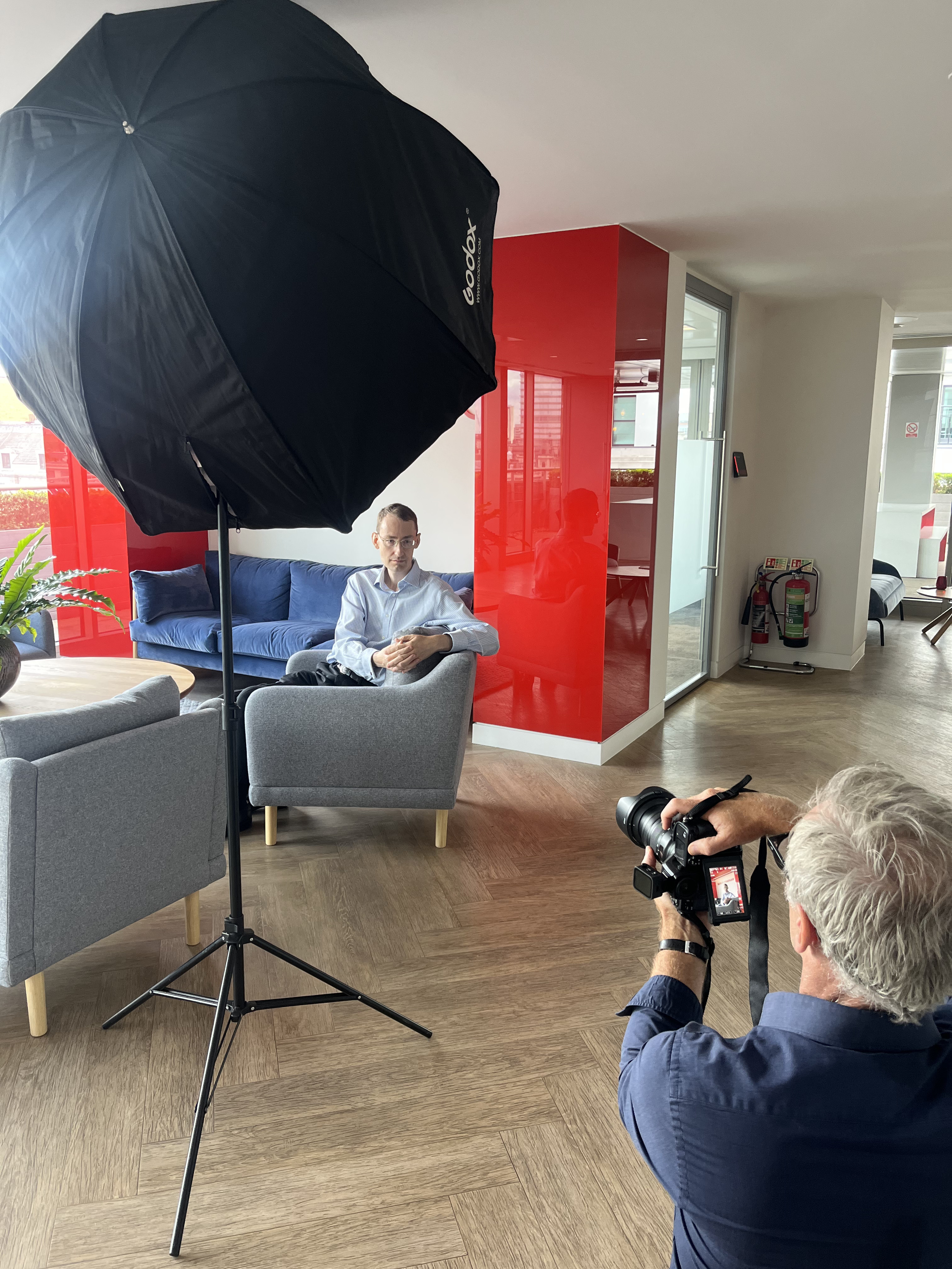 Behind the scenes during a Bain & Company podcast recording